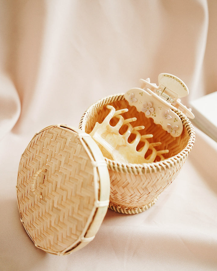 Cloud Bamboo Storage Box with Lid displayed on a desk, organizing small accessories and adding style to the dressing table.